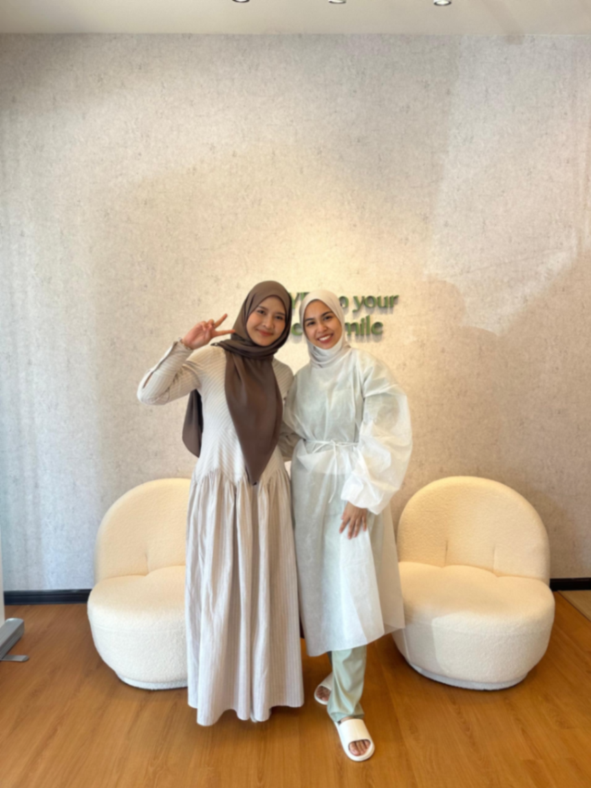 Patient photo with YES Dental staff after a visit