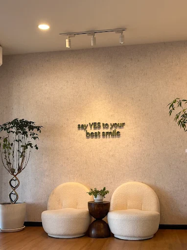YES Dental cozy waiting lounge with plants